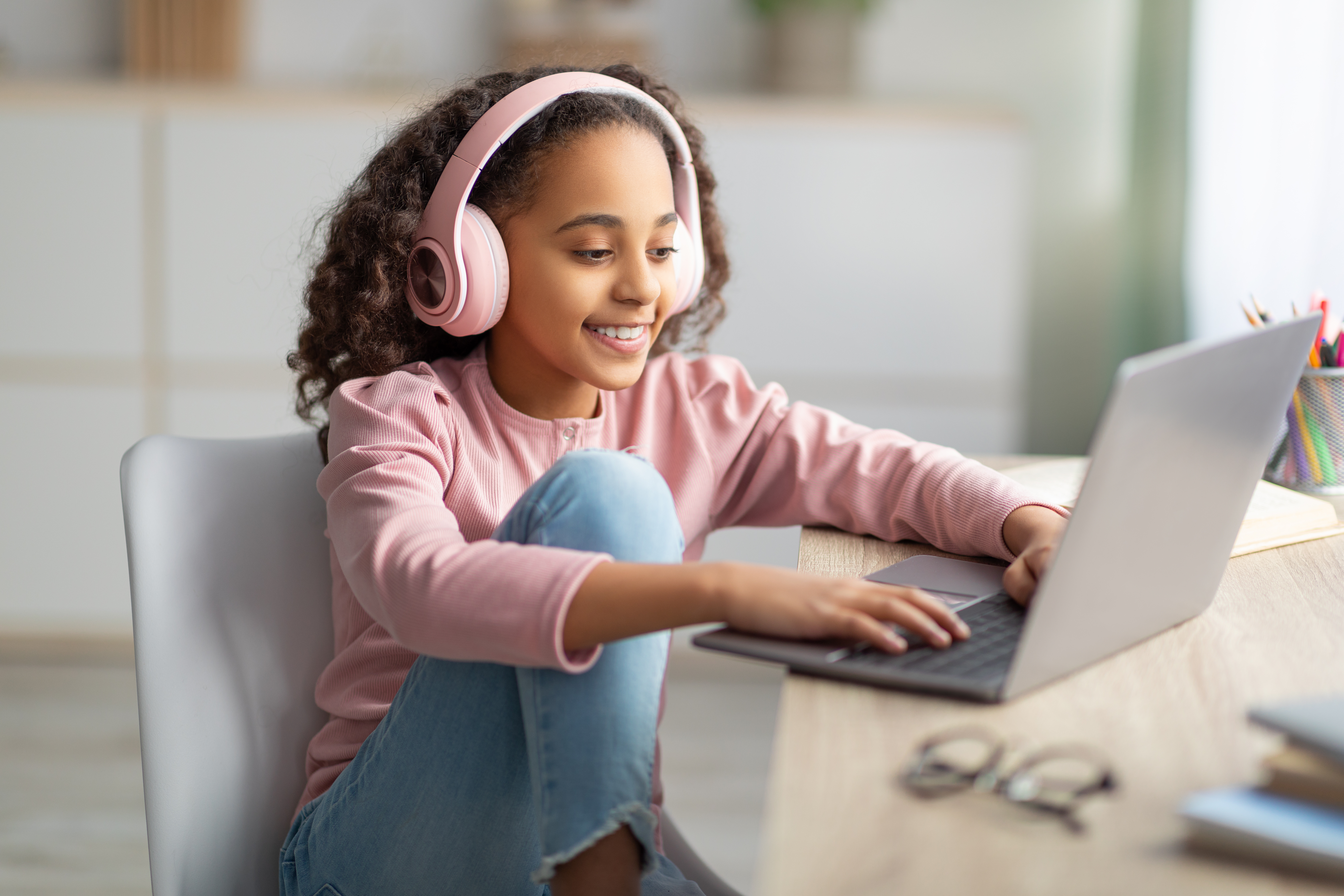 person listening to wireless headphones